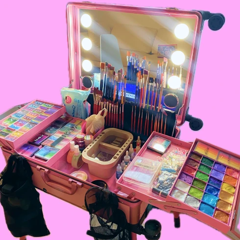 Professional makeup case with glitter, brushes and paints used for Beauty Bar by BloomART