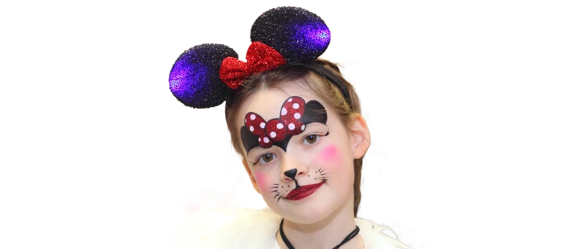 Girl with Minnie Mouse face painting and ears headband