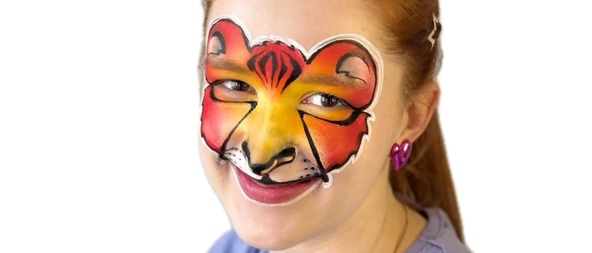 Face painting of a tiger on a child's face
