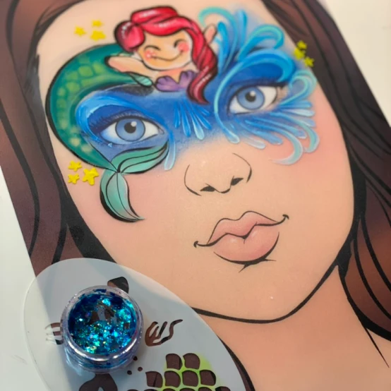Mermaid face painting design sample on paper