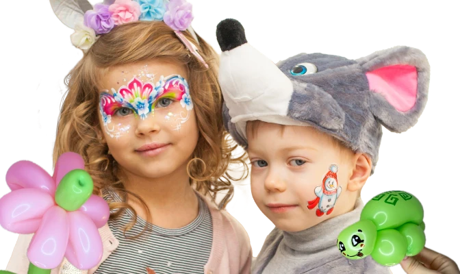 Girl with unicorn face art and flower balloon, boy with mouse hat and turtle balloon